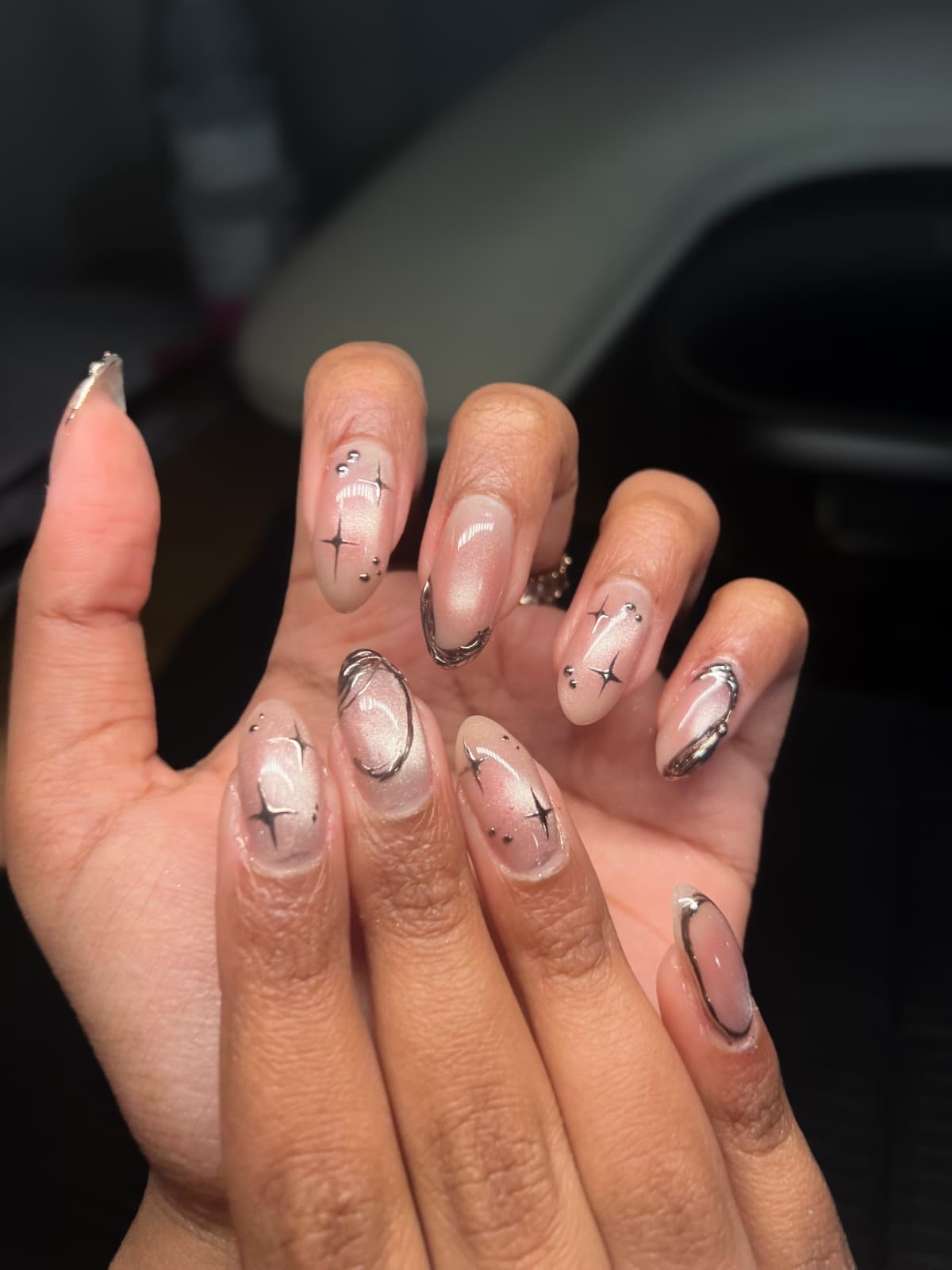 Pink and white abstract line nail design